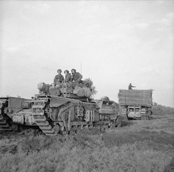 Churchill Tanks Moving Up To Attack