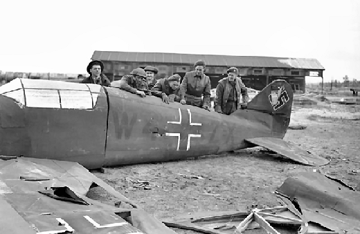 examining a captured German dummy aircraft