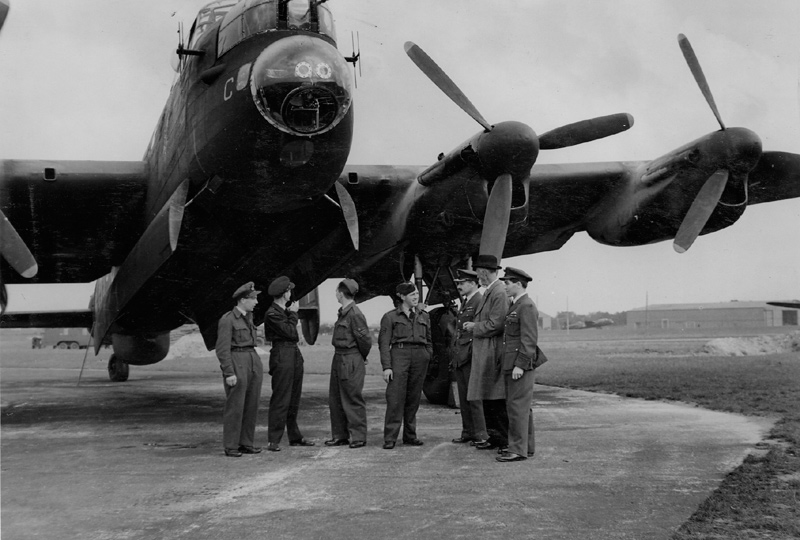 Royal Air Force Airmen Talking with Locals