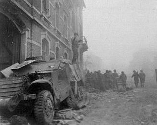 Wrecked Half-Track Stringing Communication Wires