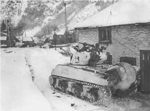 Whitewashed Sherman in pursuit of Panzers