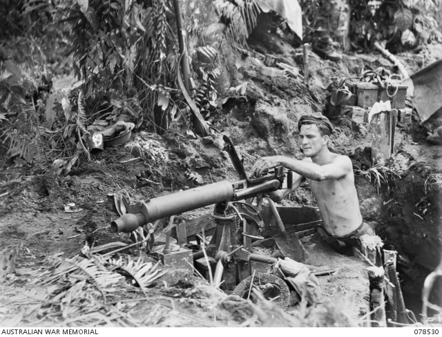 Checking His Vickers Gun