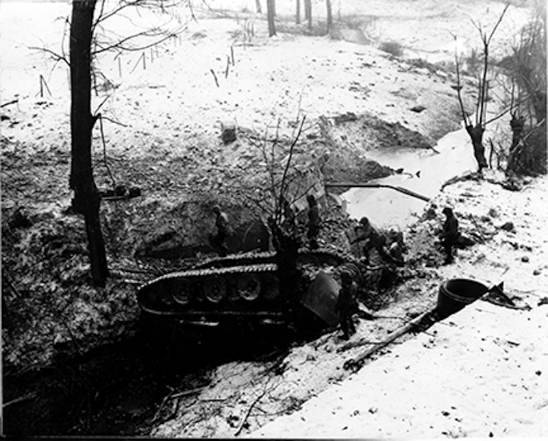 Overturned German Tank Used as a Bridge