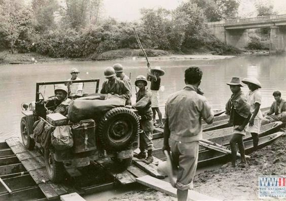 Troops Ferry Jeep Across River