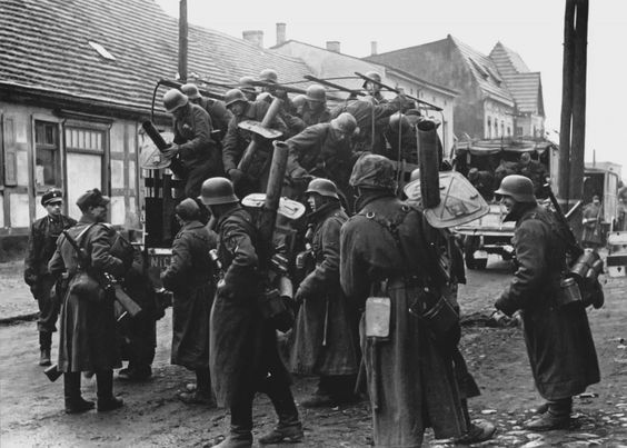 <i>SS</i> Troops Unloading Trucks