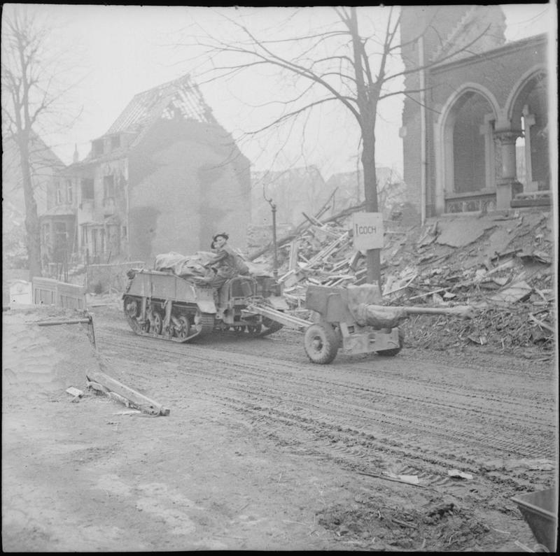 Loyd carrier towing a 6-pdr anti-tank gun