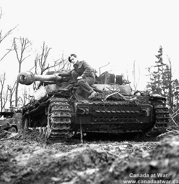 Examining a Damaged German 75-mm Self-propelled Gun