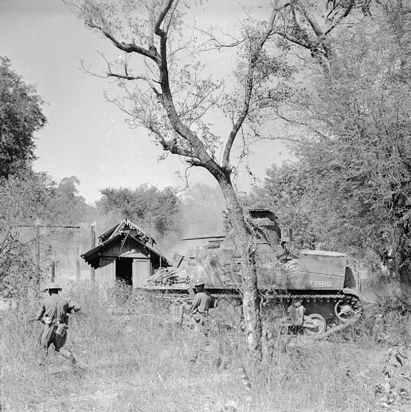 A Lee Tank Supporting Infantry