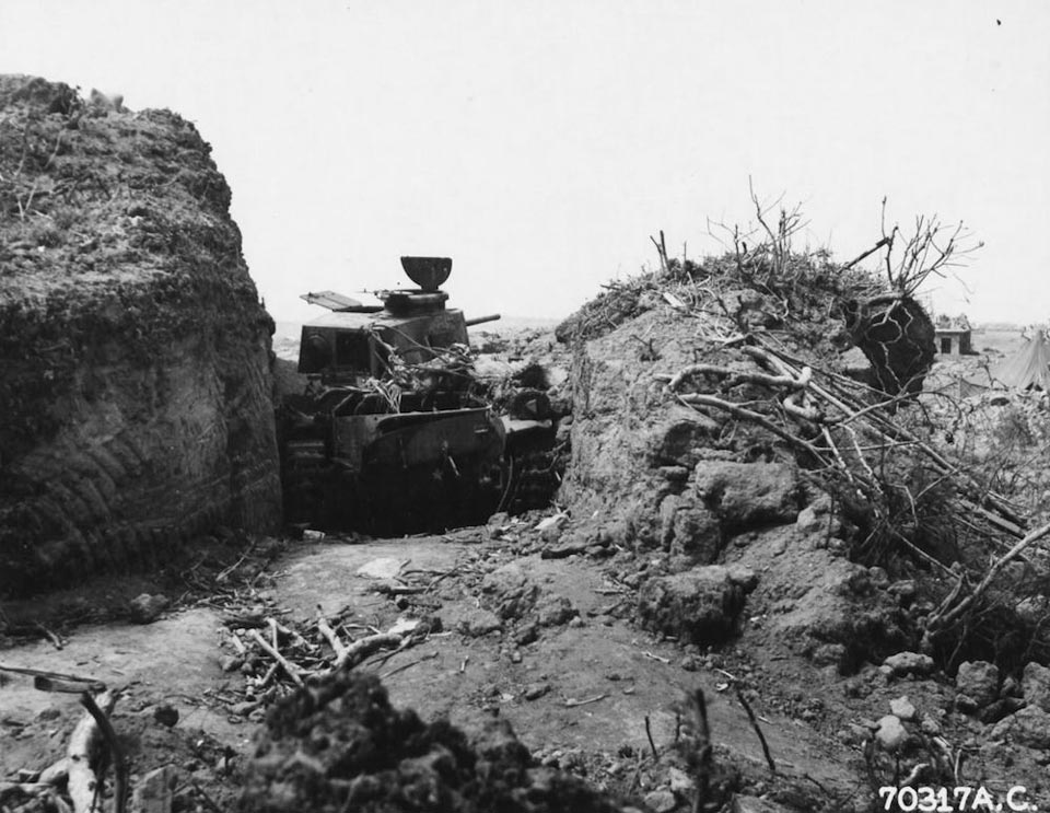 A Japanese tank wedged between banks