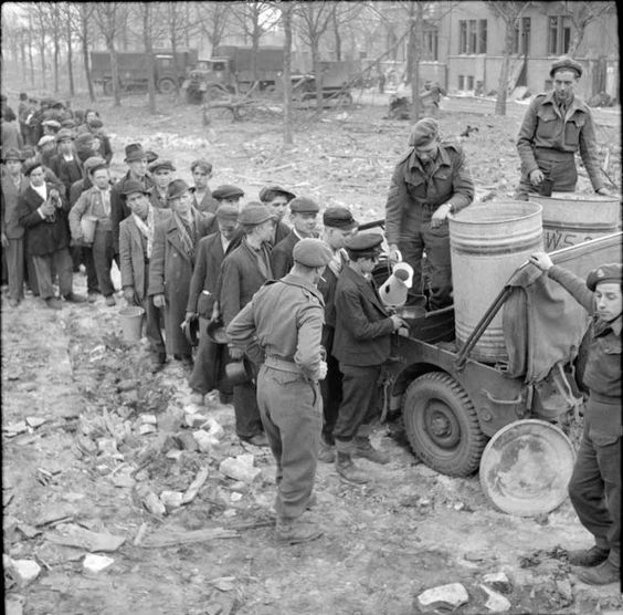 Canadians Stacking 75-mm Shells