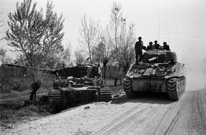 Passing a Knocked Out German Tank