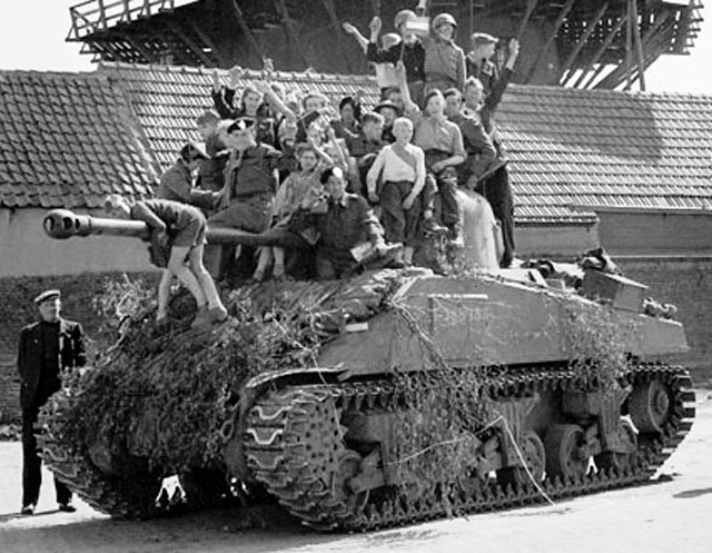 Sherman Tank Surrounded by Dutch Families