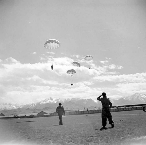 partisans wait for the containers carrying supplies