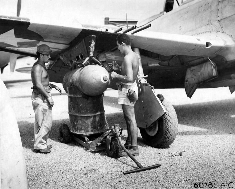 Loading 1000lb Bomb on a P-47