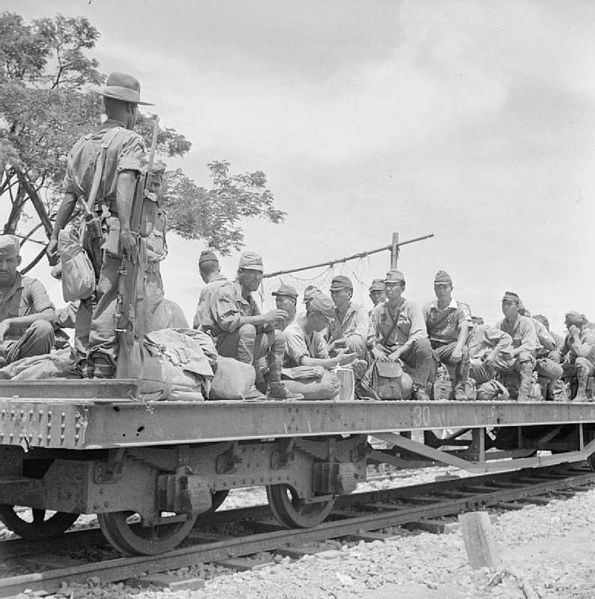 Japanese Prisoners Await Their Move to a POW Camp