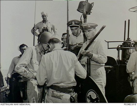 examining a Japanese Officer's sword